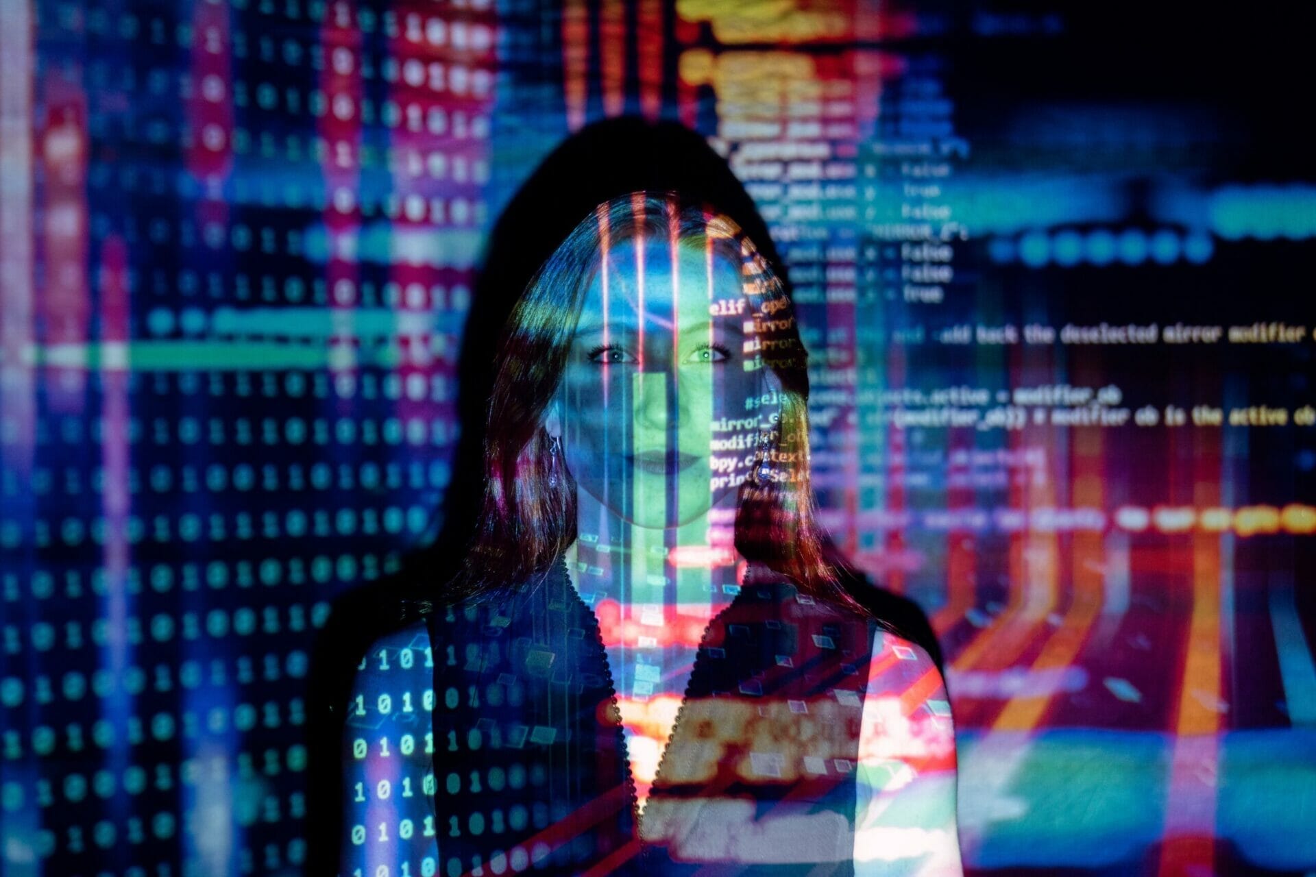 Woman standing behind transparent digital text digital tex
