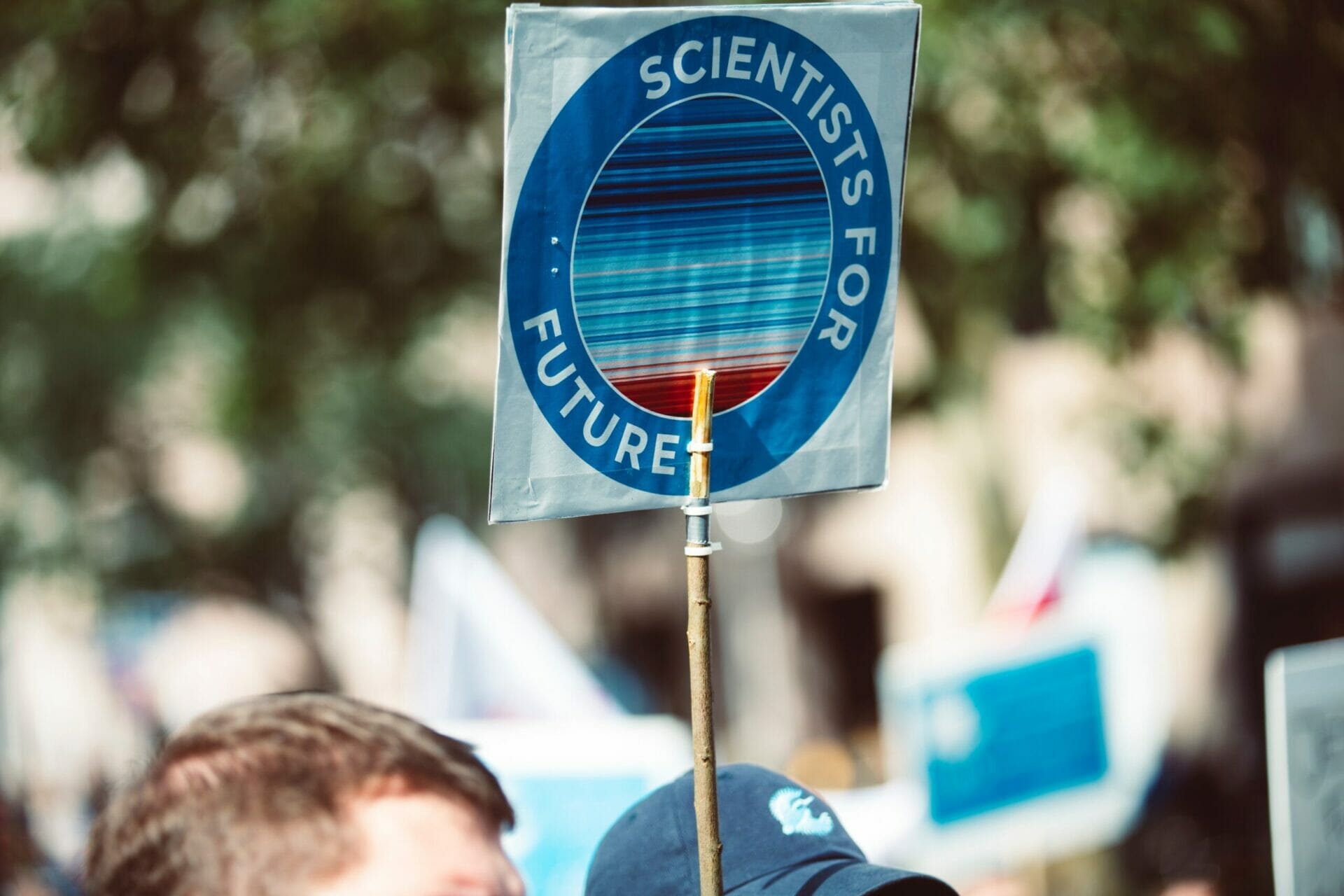 science based targets Protest sign with "Scientists for Future" logo