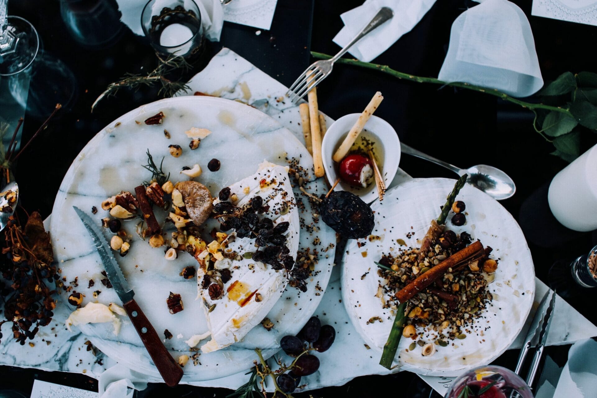 why save food Table with dirty plates, cups, half eaten food